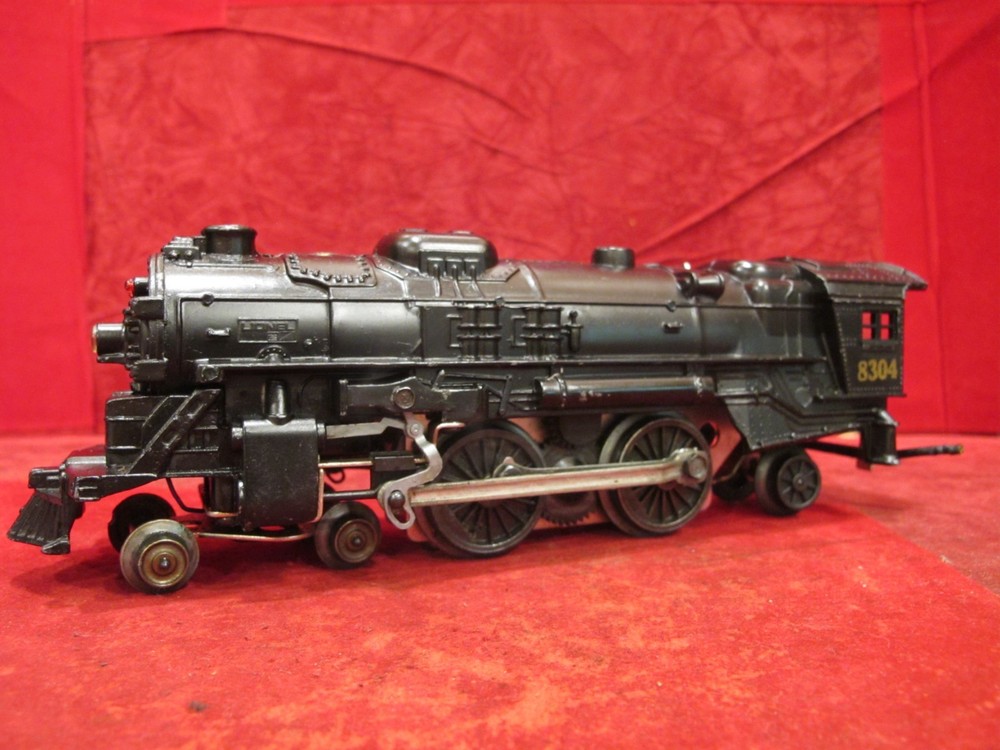 o gauge Lionel 8304 engine, die cast~ tested runs and lights smokes