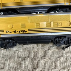 Lionel 2379 Rio Grande Diesel plus a car