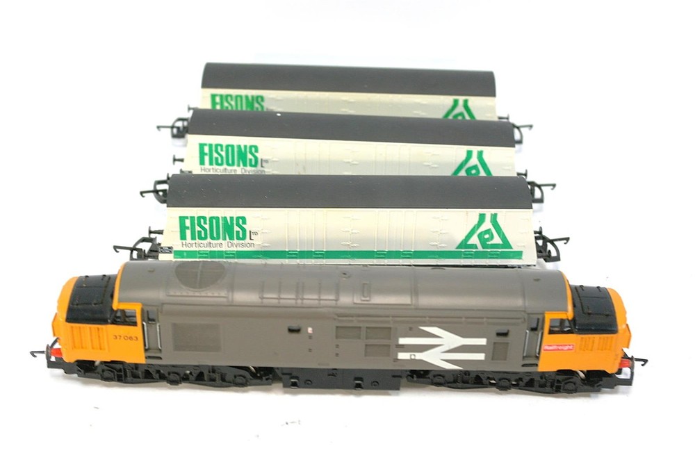 Hornby R348B Class 37 37063 plus three Shellstar bogie rail vans. Used. OO Gauge