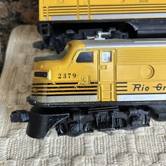 Lionel 2379 Rio Grande Diesel plus a car
