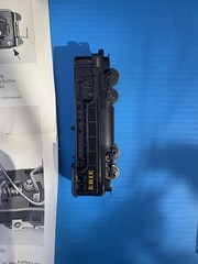 Rapido N-scale locomotive plus 3 cars.