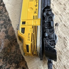 Lionel 2379 Rio Grande Diesel plus a car