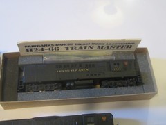 4 powered HO scale Athearn PRR Pennsylvania diesels. 2 TM, 1 SD45 and 1 SD9?