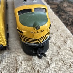 Lionel 2379 Rio Grande Diesel plus a car