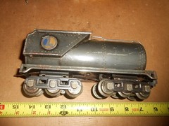 O/O-27 Lionel 263w whistle tender. as is for parts for repair.