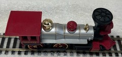 HO Scale Jupiter 4-4-0 Steam Locomotive on a Pocher V & T Flat Car
