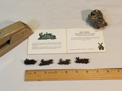 4 METAL LOCOMOTIVE MODELS and (unrelated) BOOKLET showing wood locomotive models