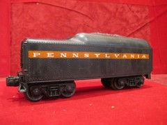 LIONEL O 249T – 250T PENNSYLVANIA ORANGE STRIPE NON WHISTLE TENDER.
