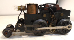 VINTAGE MARX 4 WHEEL MOTOR WITH PILOT WHEELS & E UNIT TESTED WORKS GOOD – SA A