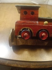 Hand Made Train Engine On Golden Rail Road Spike 6 1/2″ Long and 3 1/4″ Tall