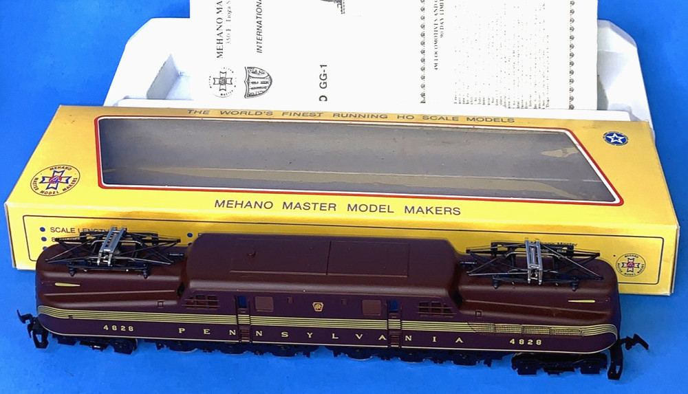 Mehano Pennsylvania Engine #4828 GG-1, In box, Nice condition Brown