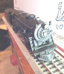 Lionel 675 2-6-2 early model w/Baldwin stamped wheels. Whistling tender.