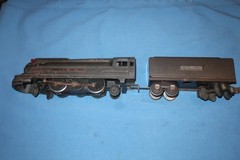 Lionel 1668E Streamlined Torpedo Locomotive and Tender. Runs well