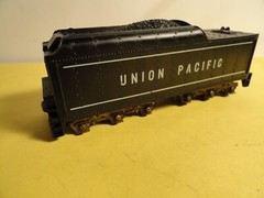 HO-GAUGE VTG. UNION PACIFIC DIE CAST 6-AXLE CAST BOTTOM 3- AXLES ARE MISSING .