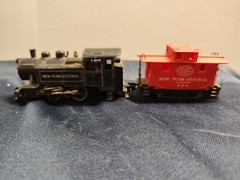 HO scale New York Central locomotive 3975 all metal. and matched plastic caboose