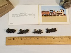 4 METAL LOCOMOTIVE MODELS and (unrelated) BOOKLET showing wood locomotive models