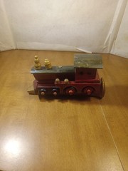 Hand Made Train Engine On Golden Rail Road Spike 6 1/2″ Long and 3 1/4″ Tall