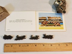 4 METAL LOCOMOTIVE MODELS and (unrelated) BOOKLET showing wood locomotive models