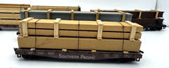 LOT OF 4 DIFFERENT HO GAUGE MODEL RAILROAD S P WOOD CARRIER CARS WITH LOADS