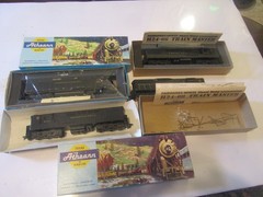 4 powered HO scale Athearn PRR Pennsylvania diesels. 2 TM, 1 SD45 and 1 SD9?