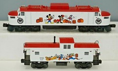 LIONEL O-GAUGE 6-18311 THE DISNEY ELECTRIC LOCOMOTIVE & 6-19723 CABOOSE