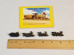 4 METAL LOCOMOTIVE MODELS and (unrelated) BOOKLET showing wood locomotive models