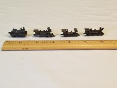 4 METAL LOCOMOTIVE MODELS and (unrelated) BOOKLET showing wood locomotive models